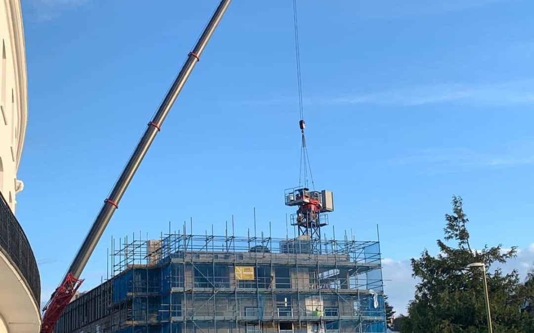 Giant crane comes down – giant moment for Torwood Street.